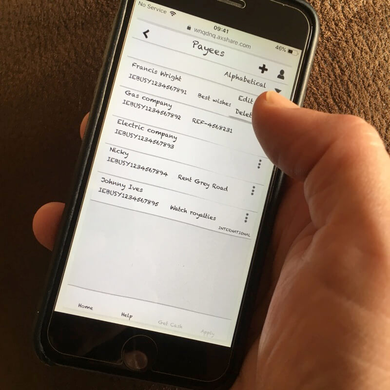 iPhone user using the prototype banking app on the screen